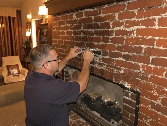 Hilton Head Island Chimney Sweep expert fixing a fireplace in Hilton Head Island, SC